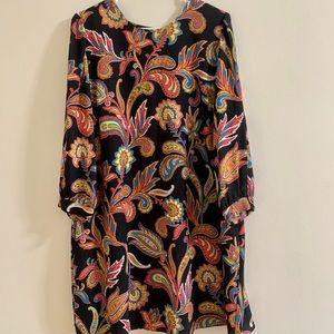 Black sheath dress with bold paisley print.